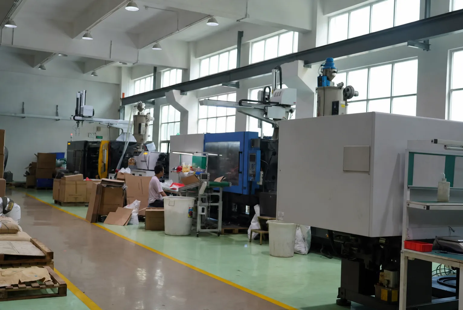 Injection molding and mold sampling area