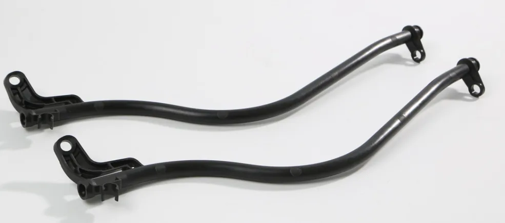 Metal automotive guide tube selected for redesign as a molded plastic part